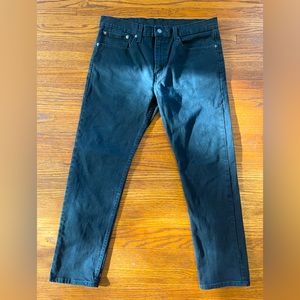 Levi’s 502 Black faded jeans